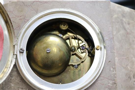 A French Art Deco bronzed spelter and marble mantel clock, the dial signed Divay height 58cm